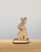 Hand drawn animals cut from wood.